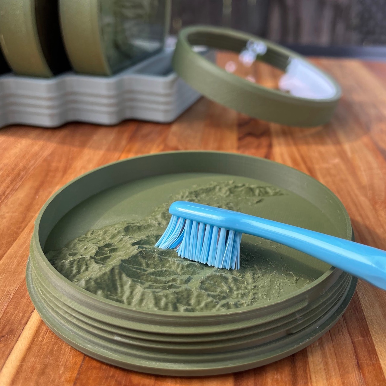 Cleaning the terrain with a soft toothbrush